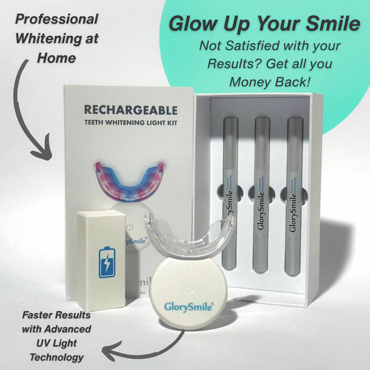 White Teeth whitening kit with rechargeable light, trays, and bottles on a white background